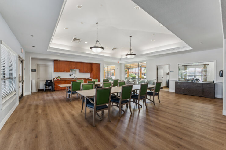 Bright, welcoming dining area with ample seating, fostering community and connection among residents.