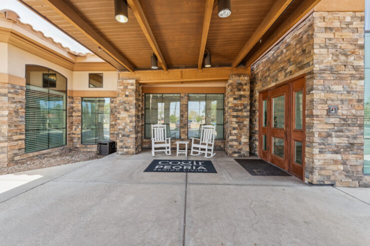 Welcoming entrance with charming rocking chairs, inviting a sense of community and comfort.