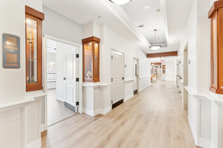Bright, inviting hallways foster a sense of community and comfort, welcoming residents home.