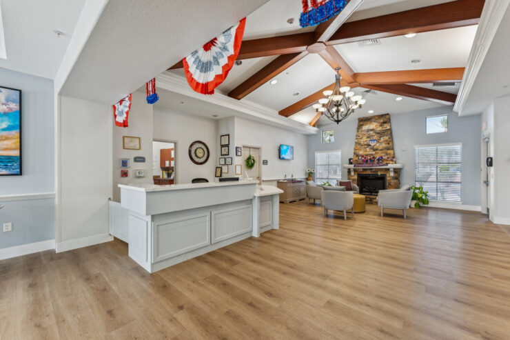 Welcoming reception area with warm decor, inviting seating, and a friendly atmosphere for all residents.