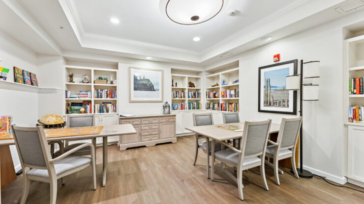 A welcoming space filled with books and light, perfect for gathering and enjoying community activities.