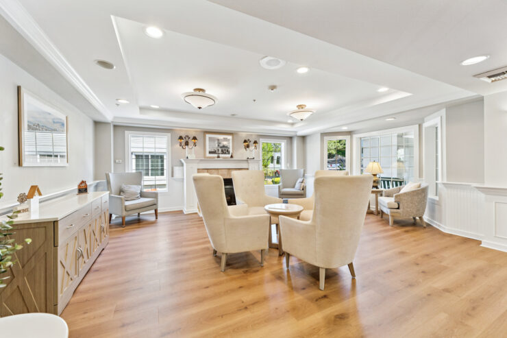 A welcoming lounge with comfortable seating invites residents to relax and connect in a vibrant community.