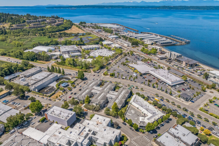 A vibrant community by the waterfront, showcasing inviting spaces and serene surroundings for relaxation.