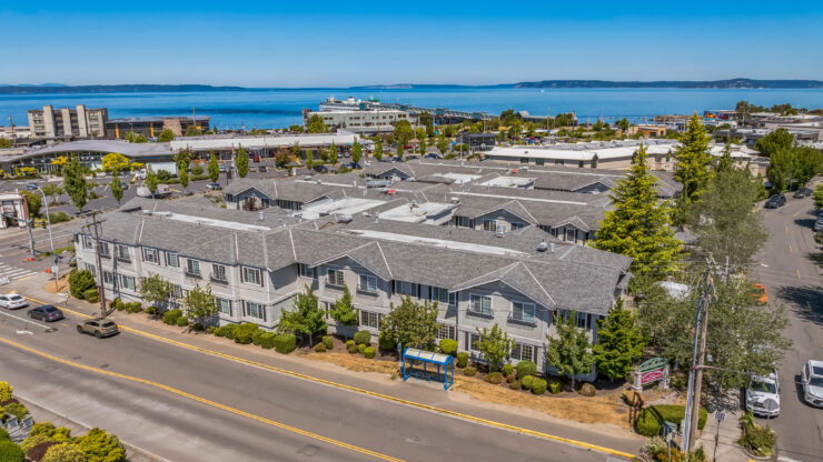 A welcoming community nestled by the water, inviting comfort and connection for all residents.