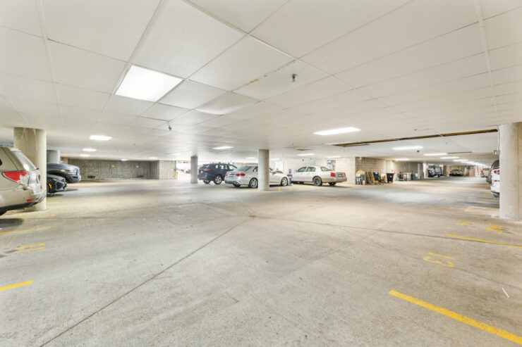 A spacious, well-lit parking area, promoting accessibility and convenience for residents and visitors.