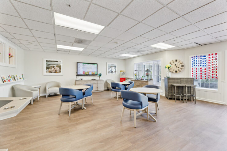 Bright, inviting common area with comfortable seating, perfect for socializing and community activities.