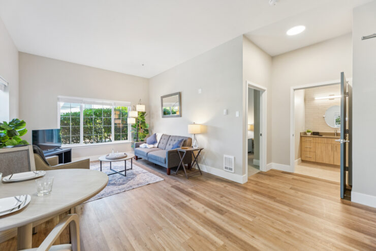 Bright and inviting, this living space promotes community and comfort, perfect for relaxation and connection.