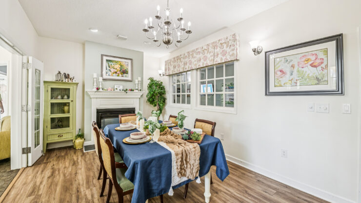 A welcoming dining area with elegant decor, fostering community and warmth for residents.