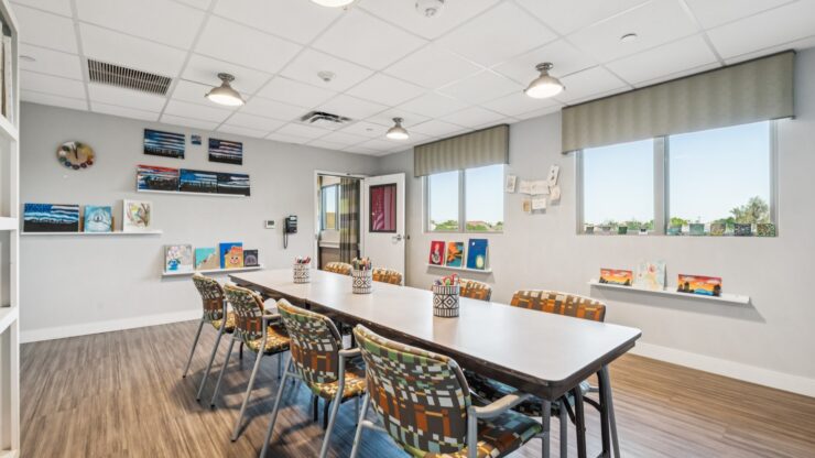 A welcoming gathering space with bright windows, inviting decor, and a sense of community.