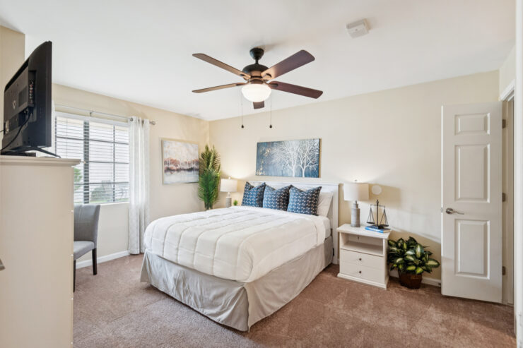 Bright and inviting, this serene bedroom offers comfort with stylish decor, perfect for relaxation.