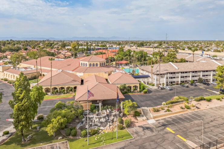 A welcoming community with vibrant greenery, offering comfort and a serene atmosphere for residents.