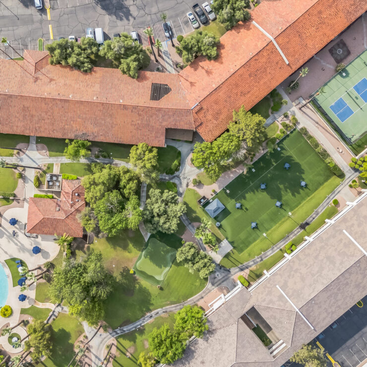 A serene community with lush greenery, inviting pools, and recreational areas fosters connection and comfort.