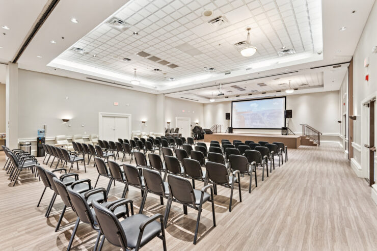 A welcoming event space with ample seating, perfect for community gatherings and activities.