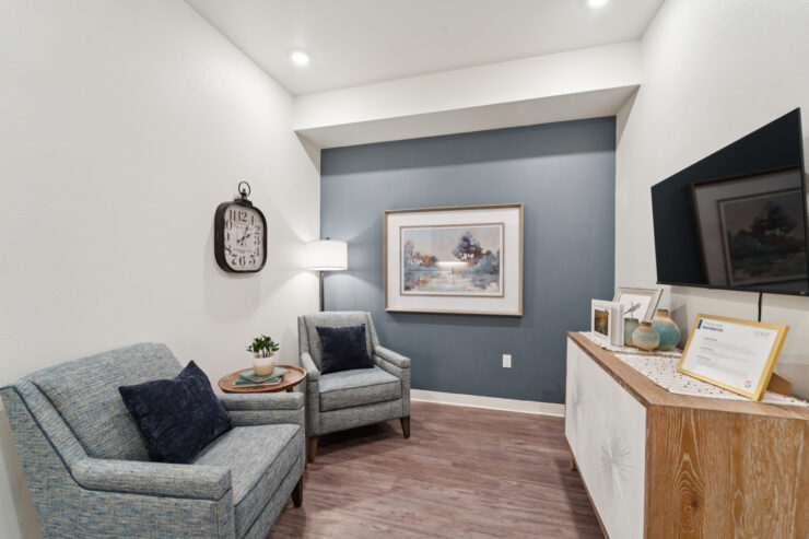 A serene lounge area featuring comfortable seating and inviting decor, perfect for community gatherings.