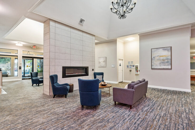A welcoming lounge with comfortable seating, inviting residents to relax and connect in community.