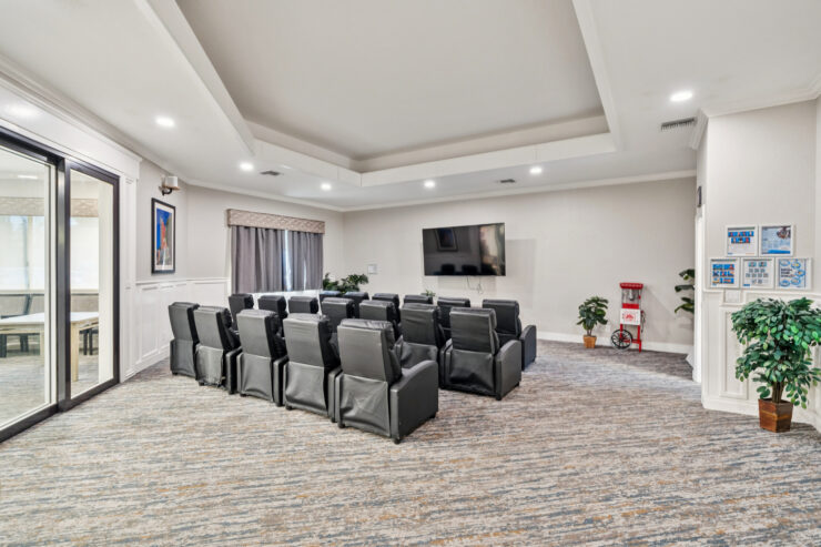 A welcoming lounge featuring comfortable seating, perfect for community gatherings and entertainment.