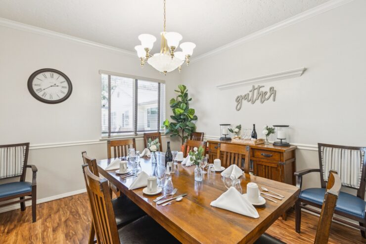 A welcoming dining area, perfect for gatherings, featuring elegant decor and a warm, inviting atmosphere.