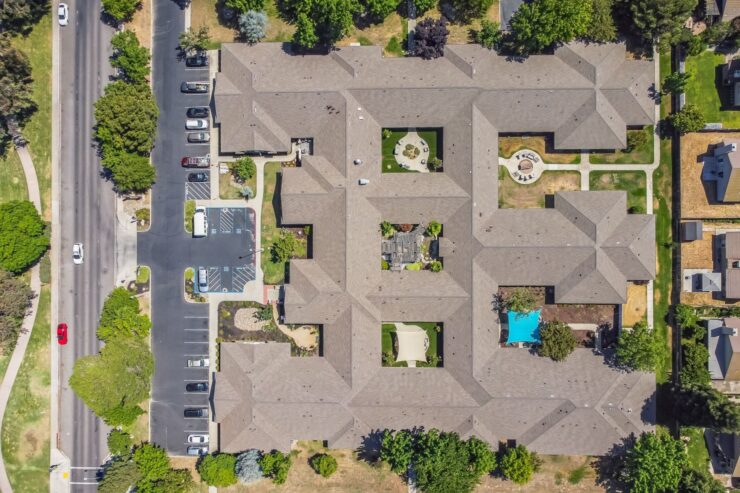 A welcoming retirement community featuring serene gardens and inviting spaces for connection and relaxation.