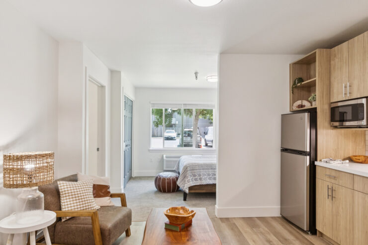 A welcoming living space filled with light, promoting community and comfort for all residents.