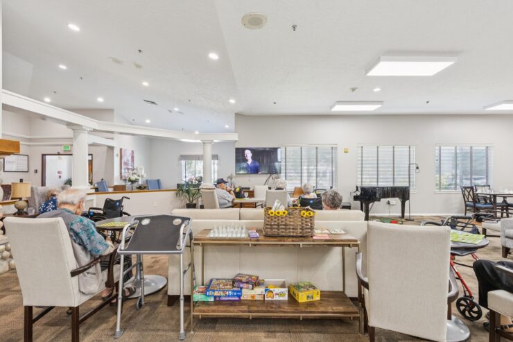 A welcoming common area filled with comfortable seating, fostering community and connection among residents.