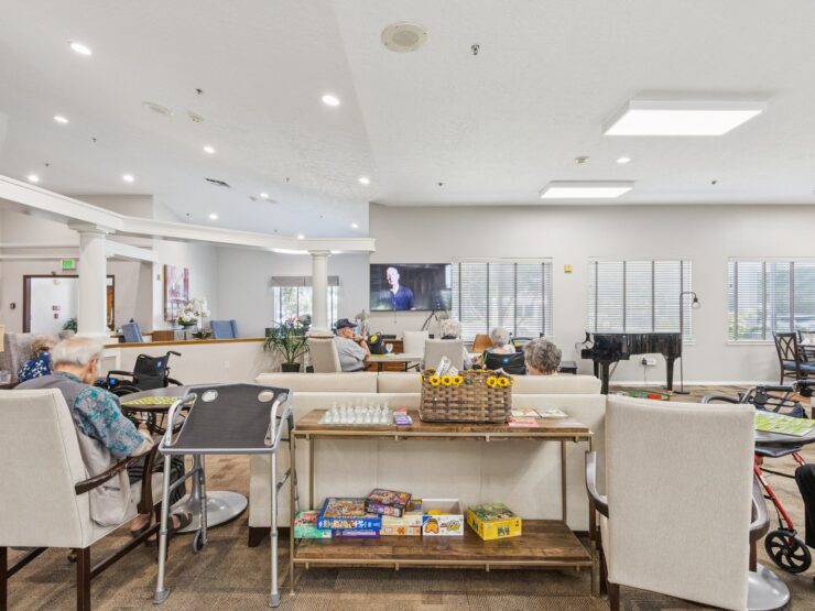 A welcoming common area filled with comfortable seating, fostering community and connection among residents.