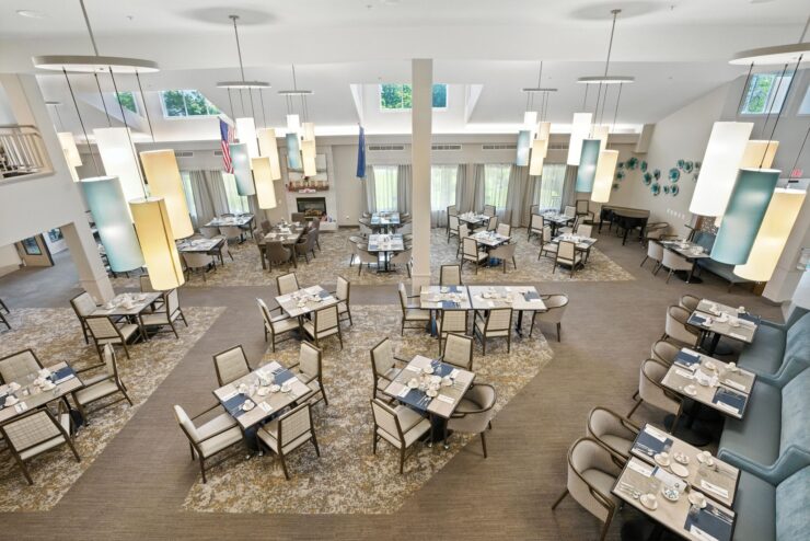 A welcoming dining area with elegant decor, inviting residents to gather and enjoy meals together.