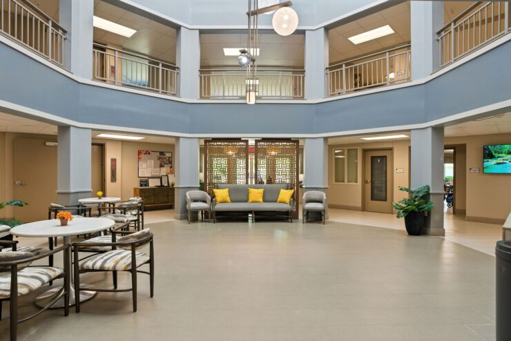 A welcoming communal space filled with light, inviting seating, and a sense of togetherness.