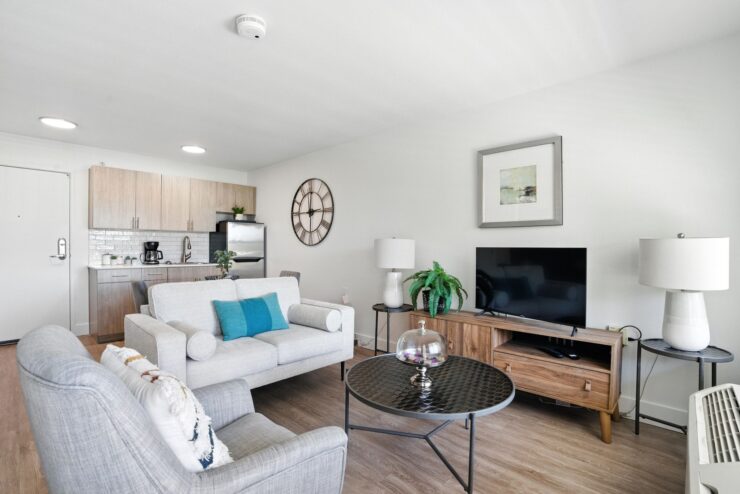 A bright, inviting living space designed for comfort, featuring modern furnishings and a warm atmosphere.