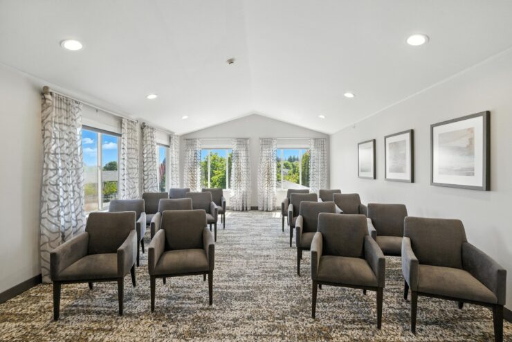 A welcoming community space with comfortable seating and abundant natural light, perfect for gatherings.