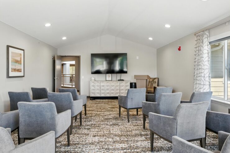 A welcoming community space, featuring comfortable seating and a modern ambiance for gatherings.