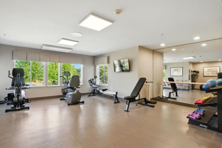 Bright, inviting fitness area with modern equipment, promoting health and community engagement.