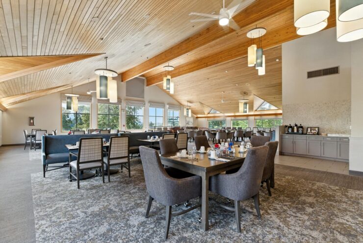 Bright, inviting dining area with spacious seating, perfect for community gatherings and shared meals.