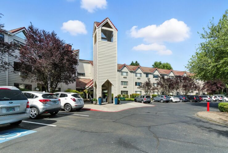 A welcoming community featuring beautiful architecture and ample parking, perfect for residents and visitors.
