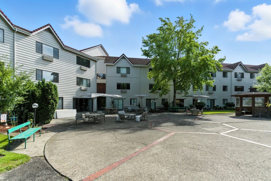 A welcoming outdoor space invites residents to relax and connect in a vibrant community setting.