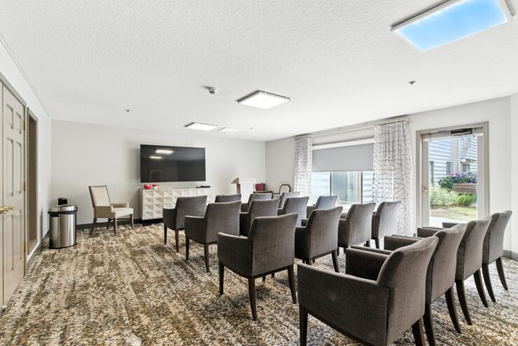 A welcoming common area with comfortable seating, inviting natural light, and a sense of community.