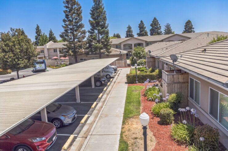 A welcoming community with well-maintained gardens and shaded parking, perfect for relaxed living.