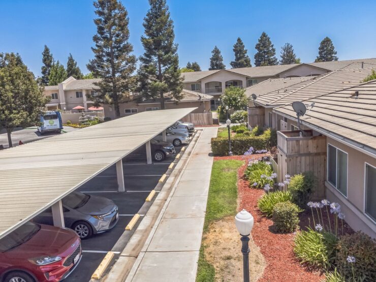 A welcoming community with well-maintained gardens and shaded parking, perfect for relaxed living.