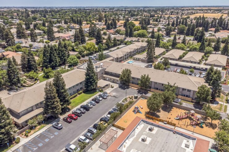 A welcoming community surrounded by greenery, promoting comfort and connection among residents.