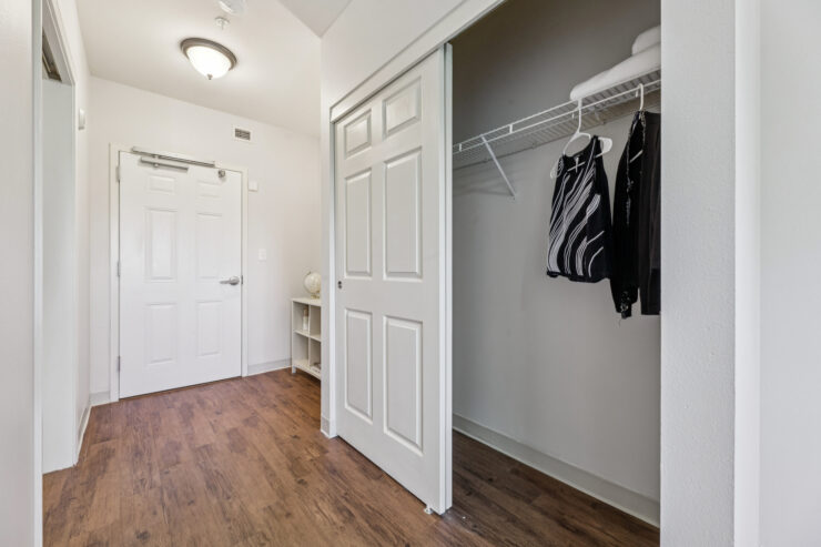 A welcoming entryway with ample storage, designed for comfort and community living.