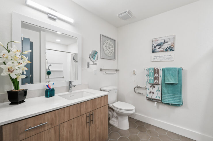 Bright and inviting bathroom designed for comfort, featuring modern amenities and a serene atmosphere.