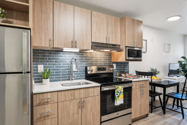 Modern kitchen space with warm wood tones, inviting atmosphere, and a sense of community comfort.