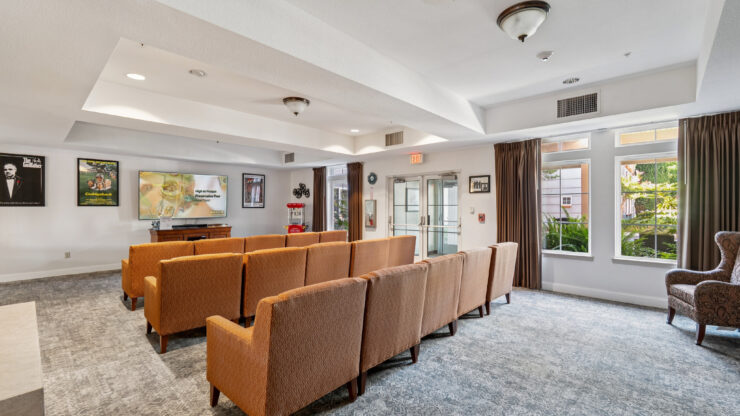 A welcoming lounge area with comfortable seating, inviting natural light, perfect for community gatherings.