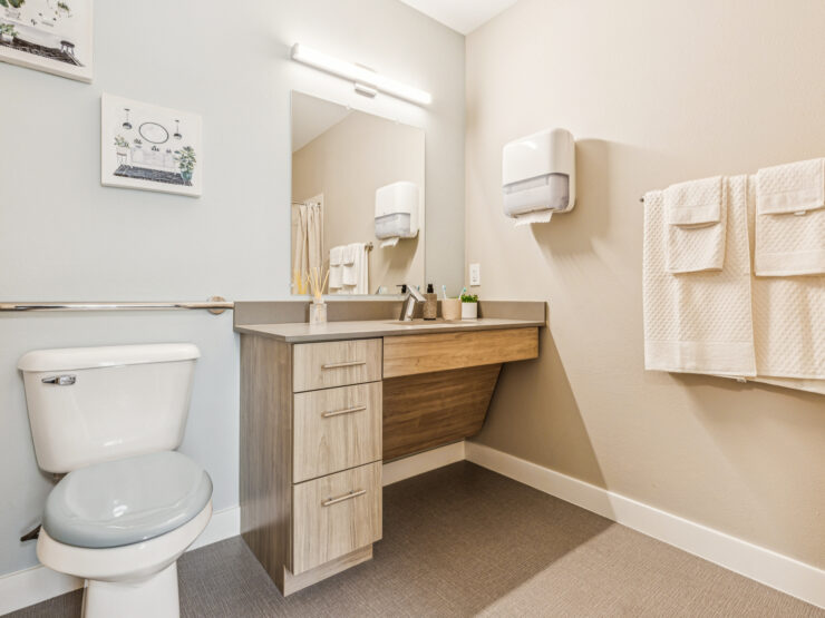 A bright and inviting bathroom space, designed for comfort and ease, fostering a sense of community.
