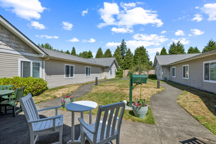 A serene outdoor space invites residents to relax and connect in a welcoming community setting.