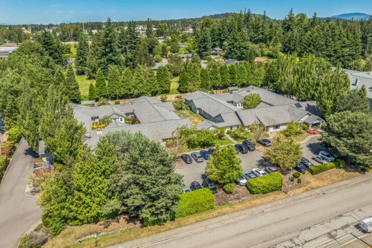 A welcoming community surrounded by lush greenery, offering a peaceful and comfortable atmosphere.