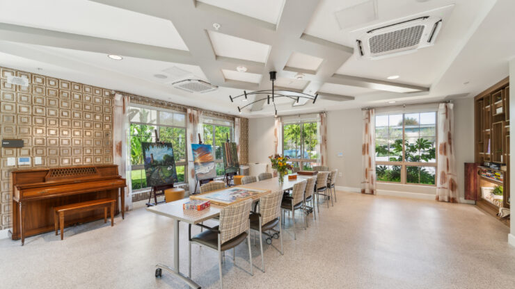 Bright, inviting common area featuring spacious seating and natural light, perfect for community gatherings.