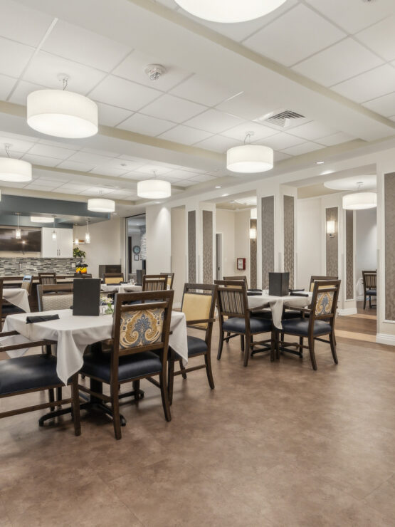 Bright, inviting dining area fosters community and comfort, perfect for shared meals and gatherings.