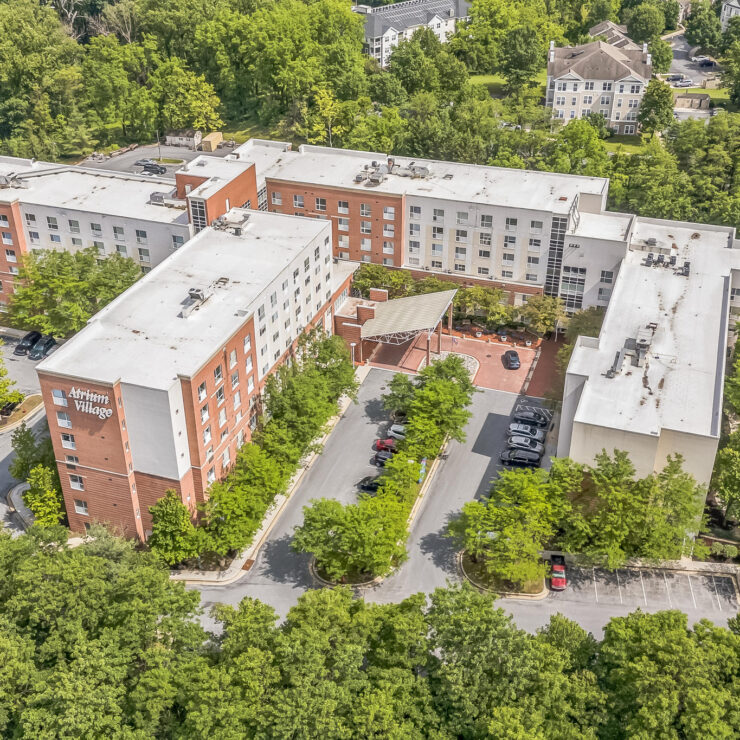 Welcoming community surrounded by lush greenery, offering a serene and comfortable atmosphere.