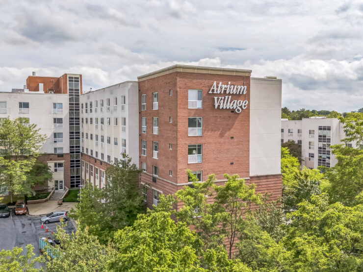 Nestled among lush greenery, Atrium Village offers a welcoming community for vibrant living.