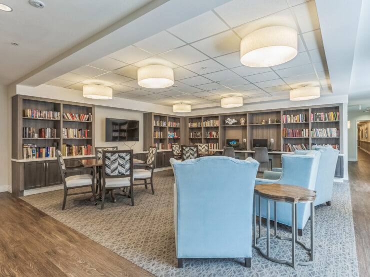 A welcoming library space filled with natural light, perfect for reading and socializing.